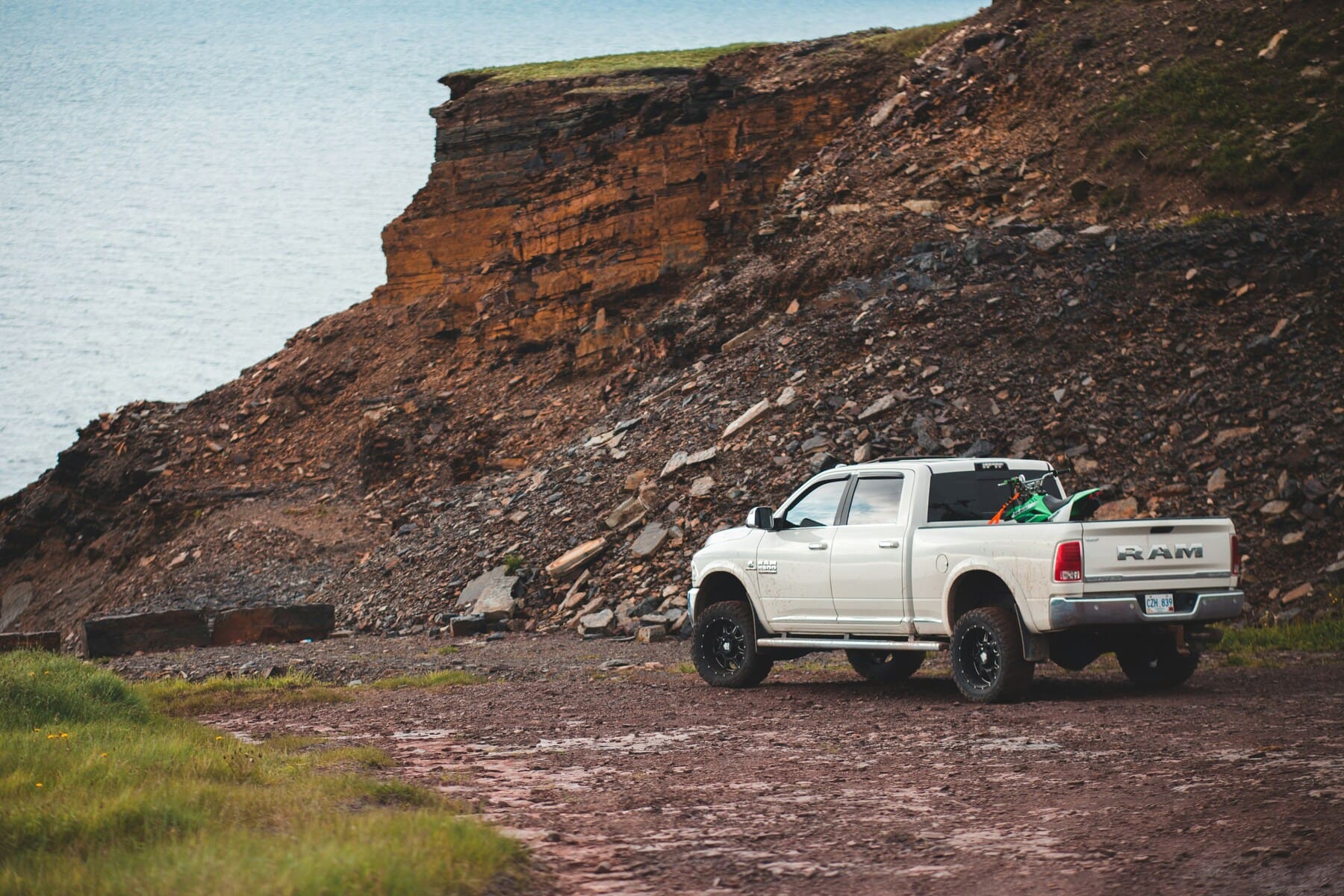 An image showing different truck bed solutions including toppers, caps, and tonneau covers, highlighting their benefits and uses.